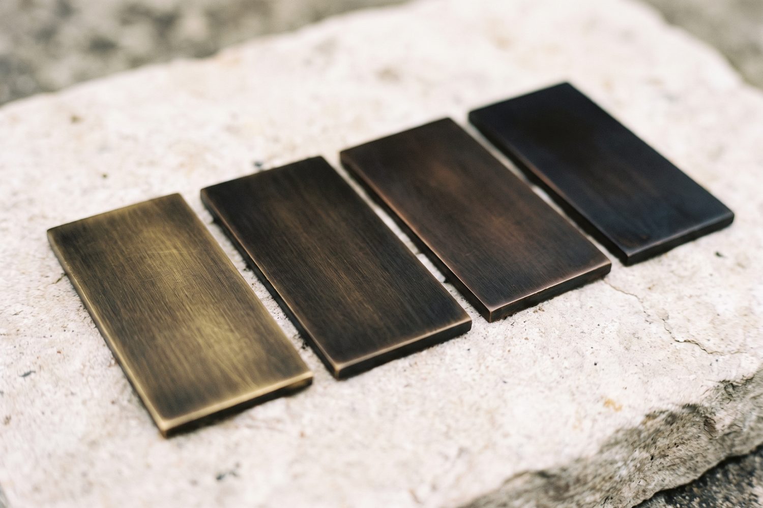 Blackened brass and bronze tone range, brown-black to near-black
