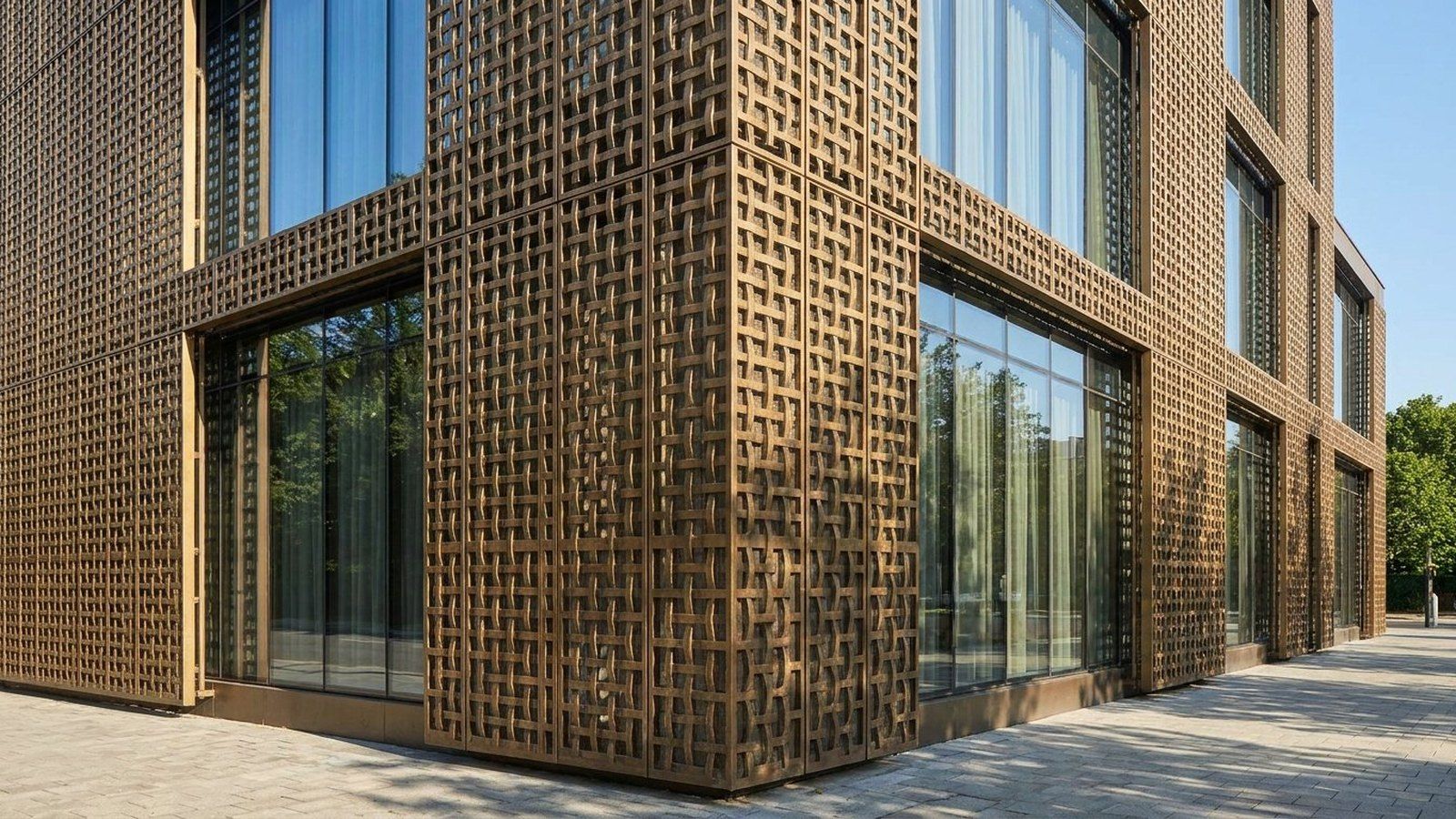 Woven brass-tone metal facade on a building