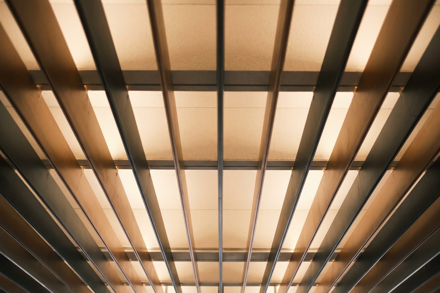 Linear metal baffle ceiling in a large space