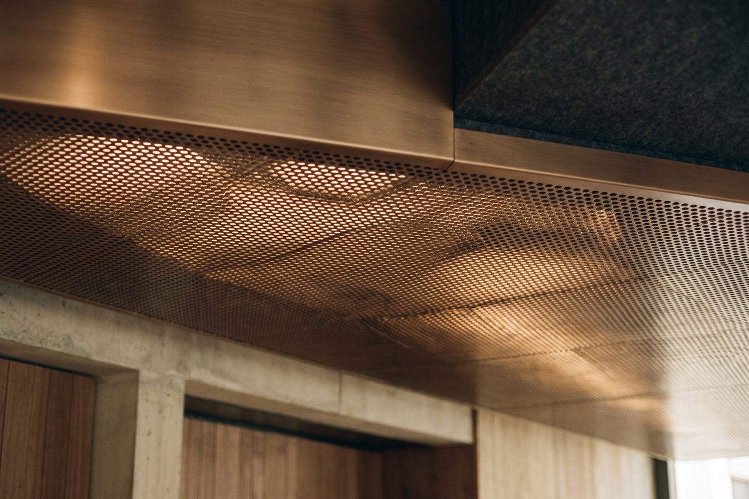 Perforated metal ceiling panel macro