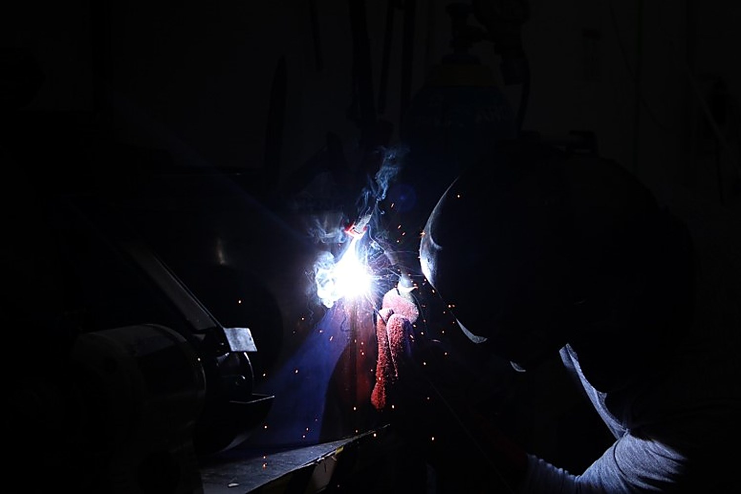 Welder building a PVD coating machine in the Dekap workshop